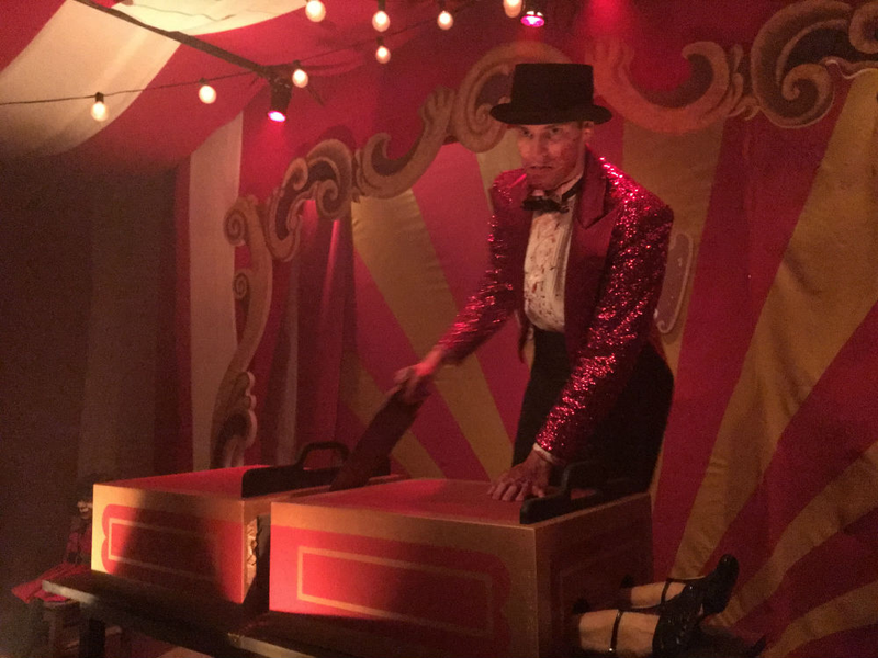 Here’s an image I was able to capture of a very mean magician cutting up a girl. Photos in the mazes are difficult cause it’s so busy, dark and you’re moving so fast.